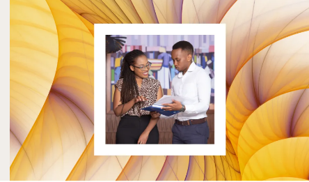 Colleagues reviewing a document